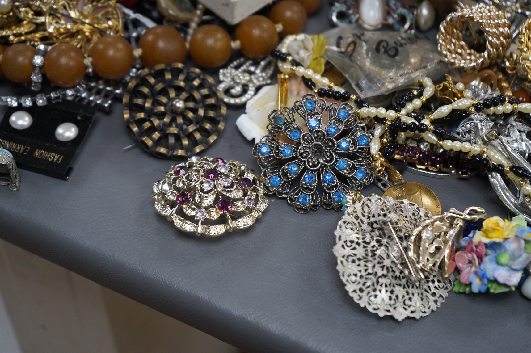 A large quantity of assorted costume jewellery.